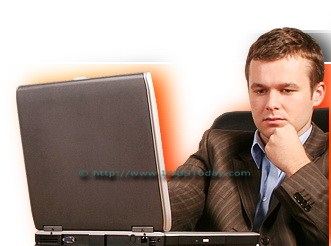 An Office Man Working on a Computer