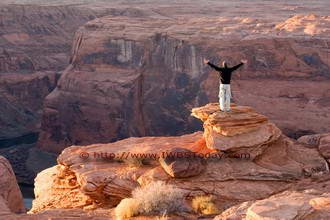 A man on the top of a mountain